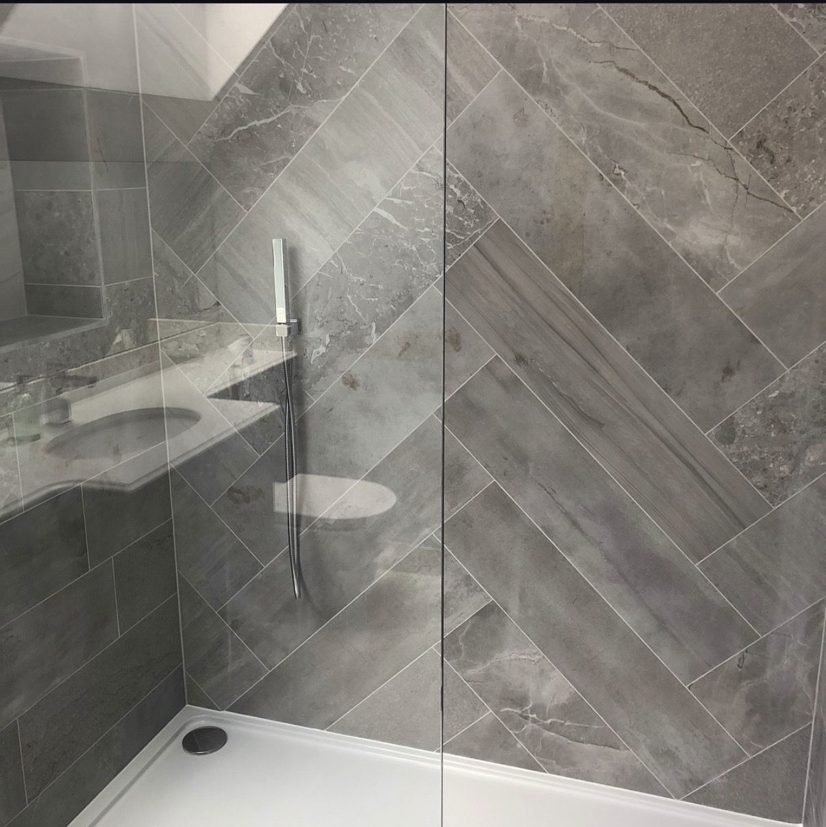 Herringbone tiled shower